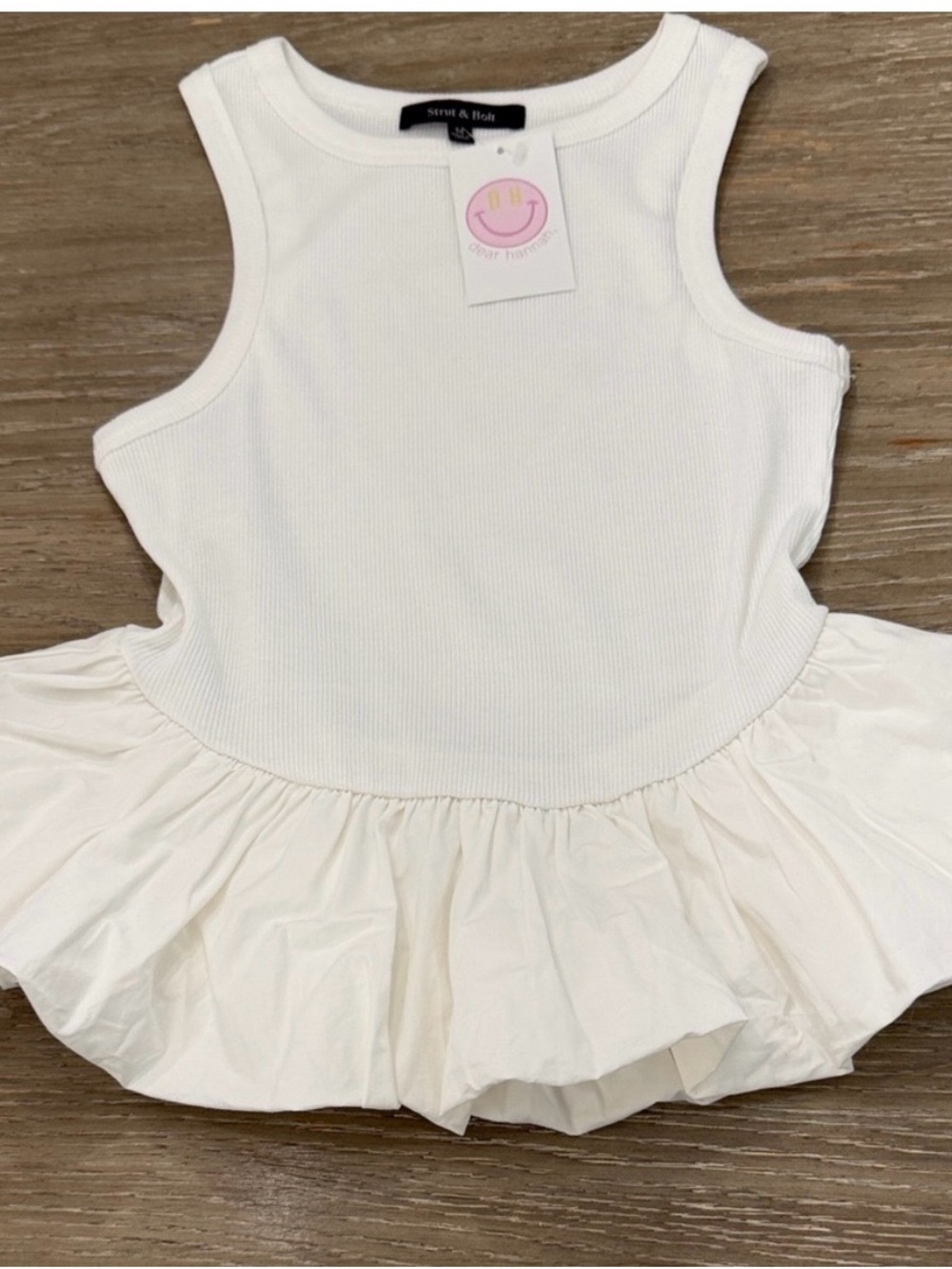Strut and Bolt Ribbed White Tank Top with beautifully detailed ruffled hem